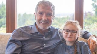 Graeme Souness with Isla Grist. “For these kids it like someone has taken a blowtorch to their skin”